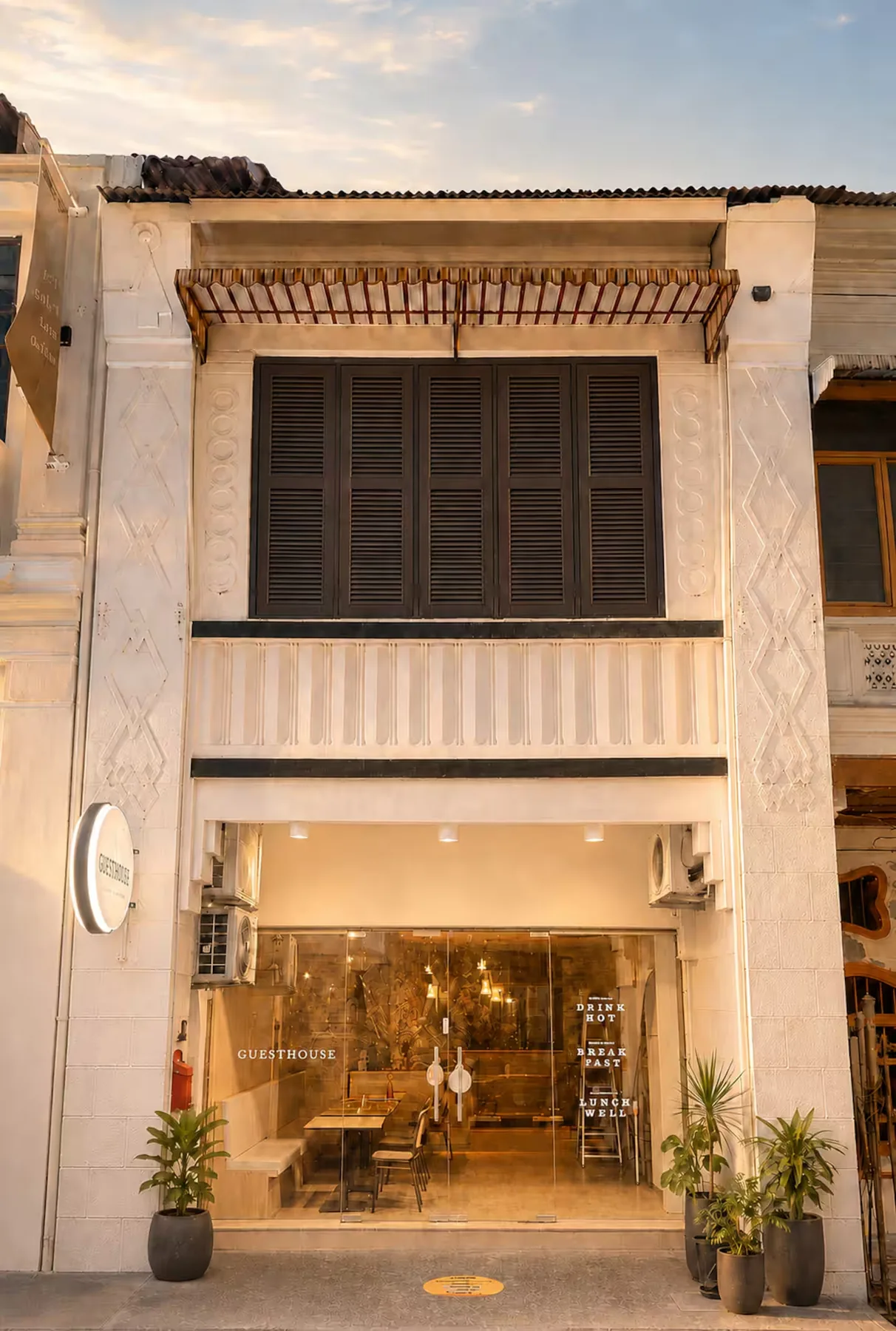 Complete view of the Commune Lane heritage shophouse façade in George Town