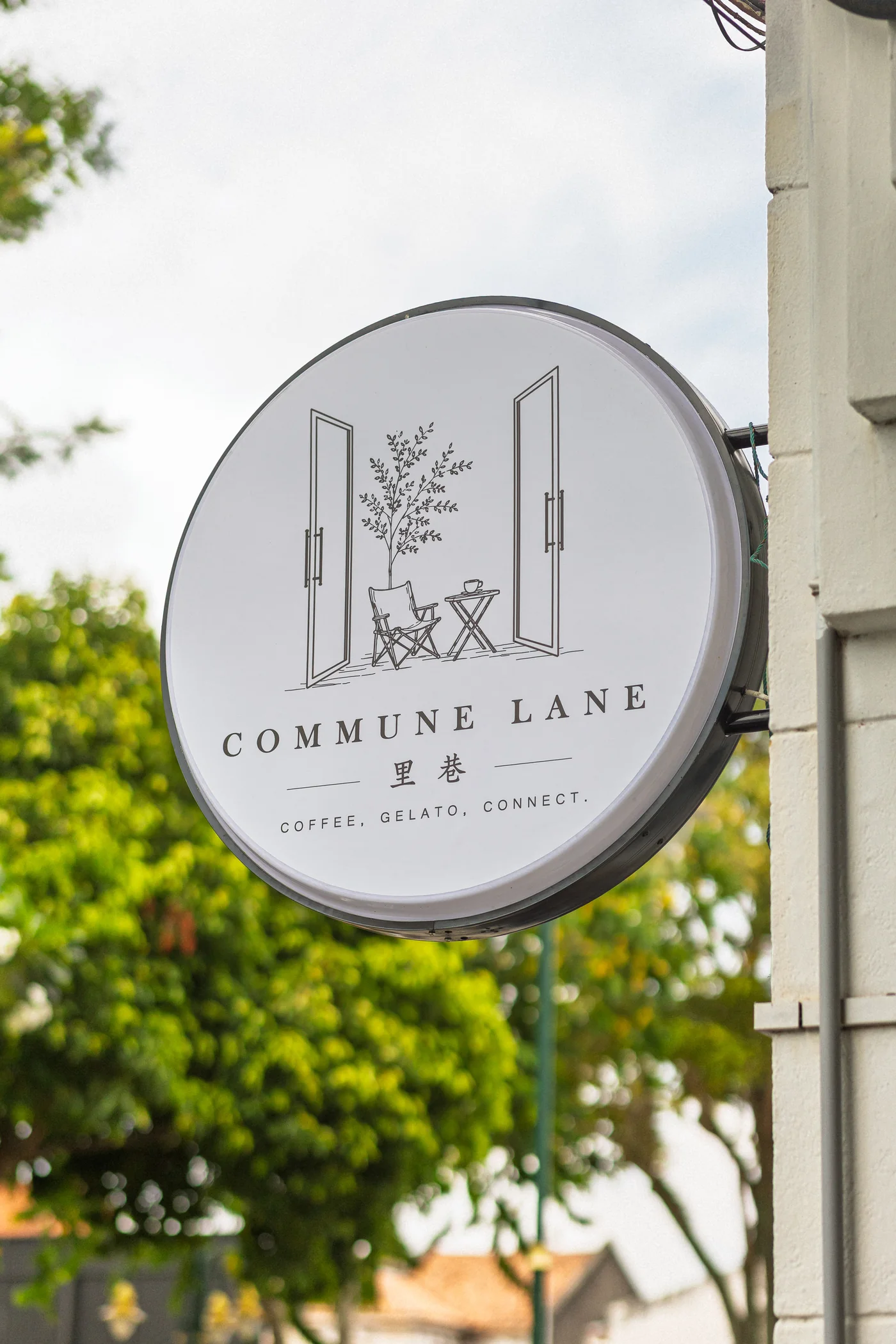 Commune Lane café and guesthouse sign